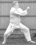 A person in a karate uniform

Description automatically generated with low confidence