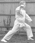 A person in a karate uniform

Description automatically generated with low confidence
