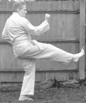 A person in a karate uniform

Description automatically generated with medium confidence
