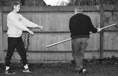 A person swinging a baseball bat

Description automatically generated with low confidence
